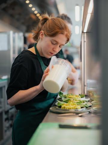 The iconic @anne.ronge in action! 

She started two years ago as an intern, and now she’s nailing our cold section. 

#neonrestaurant 
#team