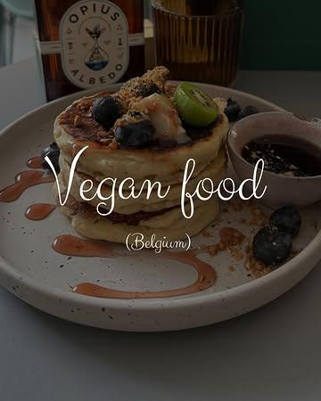 Vegan food in Belgium 🇧🇪 

1. Nöje – A cozy charming Swedish-inspired vegan café in Schaerbeek, Brussels. It’s also dog-friendly, allowing you to enjoy your visit with your furry companion. @noje.be 

2. Knol & Kool is a vibrant vegan bistro and supermarket located in the heart of Ghent, Belgium. The shop offers a variety of organic produce, bulk dry goods, vegan essentials, and specialty items like homemade granola, vegan cheeses, and zero-waste products. Both the restaurant and shop are fully dog-friendly. @knolkool.gent 

3. The Hard Rock Café Brussels is located in the heart of the city at Grand-Place 12A, 1000 Brussels, Belgium. We had delightful dishes which were clearly marked vegan. @hardrockbrussels 

4. The Judgy Vegan Café & Bar is a cozy, fully vegan café located in the Marolles district of Brussels. The café is known for its commitment to animal rights, sustainability, and community engagement. Incredibly dog-friendly. @thejudgyvegan 

5. Lil Bao is a vibrant, fully vegan restaurant in Brussels that brings Taiwanese-inspired comfort food to life through its signature fluffy, funky bao buns. Located in the Marolles district, it offers a playful and colorful dining experience. @lilbao.be 

6. Cuberdons are a vegan cone-shaped confection with a hard, gum arabic-based crust and a soft, syrupy center. Traditionally raspberry-flavored and purple, they now come in various colors and flavors, including strawberry, lemon, and chocolate. Their distinctive shape and burst-in-your-mouth texture make them a favourite of ours. 

#vegan #cuberdons #hardrockcafe #belgium