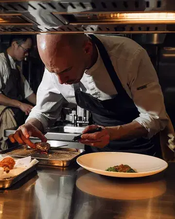 Behind the scenes, the kitchen works its quiet magic ✨ Every product, dish, wine, and preparation is thoughtfully considered and created for you. We collaborate with passionate producers committed to respecting their environment, bringing their harvests to life on our plates. Reserve your next experience with us.