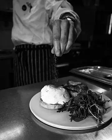 House-smoked pork.
Poached eggs.

EGGS BENEDICT