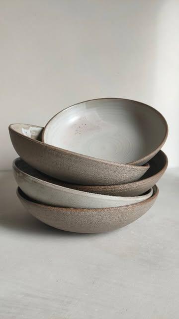 Deep plates PRE-ORDER 🌿
I'm glad to offer these unique deep plates in pre-order, available in 5 glaze combinations and 2 sizes. 
Here is the large size preview (21cm).
Next week, they'll be available online, and I'll send out a newsletter. 
The making time will depend on the number of orders, but it should be ready for April. 
.
The glaze combinations on grey stoneware include:
1. White waves
2. Meteor grey
3. Linen & oak brush
4. Linen & oribe green brush
5. Linen & lilac brush
Each piece is one-of-a-kind, featuring versatile glaze overlays and wood ash glaze variations that bring a sense of surprise.
.
Pre-ordering lets you combine your favorite glaze combinations and supports a more sustainable production for me.
My studio is small, and with other projects and courses, I need to adapt my workflow.
.
Any favourite glaze combinations already?
.
{FR}
Les assiettes creuses arrivent en pré-commande!
2 tailles : 16cm et 21cm en grès gris
5 couleurs, au choix parmi :
Vagues ~ Lin combiné avec la cendre de chêne, vert oribe ou lilas ~ Gris météore 
.
Je les proposerai en ligne la semaine prochaine (inscrivez-vous à la newsletter) et elles seront réalisées pour vous à la demande. 
Cela vous permet de choisir et moi, de ne créer que ce qui sera commandé.
.
Une préférence parmi les émaux proposés ?
.
.
#artsandcrafts 
#deepplates #ceramicstudio #studiopottery