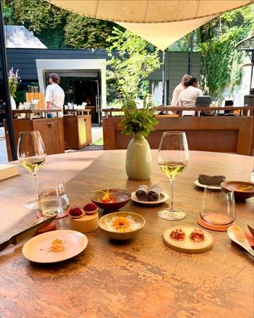 ¡Toma! 🌟 - Liège 🇧🇪 

At @toma_liege ! we had the pleasure to enjoy the Immersion Menu in the vibrant “cueuillette” season (May–September).

According to the rhythm of the year, ¡Toma! presents three distinct thematic approaches to their Immersion experience: Conserve, Sources and Cueuillette: this one is all about abundance, freshness, and bold seasonal vibrancy—each ingredient snatched by hand at its peak, offering vivid, raw, and evocative flavors. 

Our tasting journey included: 
	🐟 smoked trout confit with beurre blanc and 
	🐚 mussel brioche with velouté and parsley 
	🧅 braised onion with béarnaise
 🦆 duck dumpling with nettle, chili & agastache
	🥩 “Tartine de Lothar” storytelling dish
	🌮 nixtamalized papa tacos with salsa verde
	🐠 grilled turbot with fennel & rosemary
	🍧dessert of cosmos with redcurrants & meringue
	🫐cassis diplomat cream with red fruits and spices

This rich succession of small bites unfolded like a garden sketch—drawing on Chef @thomas.troupin immersive cooking concept, where the boundaries between chef, producer, ingredients, and guest dissolve to create a shared moment of sensory storytelling .

Troupin describes his cuisine as a way to bring people closer—to evoke feelings through the act of cooking, erase walls between the dining room and kitchen, and between producers and eaters. His season‑driven menu deeply honors local growers, whose produce is gently nurtured to concentrate aroma and flavor in perfect terroir expression.

We left with hearts (and stomachs) full: a dance of textures, herbaceous freshness, smoky echoes, delicate sweetness, and spicy thrills—all choreographed by season and respect. If you ever find yourself in Liège between May and September, you must try Cueuillette—it truly tastes like summer, especially in the beautiful garden of the restaurant. 

#michelinstar #michelinguide #gaultmillau #Liege #wallonie #seasonal #seasonalproduce #summer #greenstar #local #localproduce #garden #gastronomia #gastronogram #gastronom