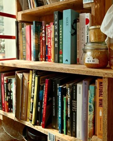 One thing that slowly happened over the years at Fermenthings is that the space also became a library.

At this point there are probably more than 200 books around fermentation, food culture and ecology sitting on the shelves of the shop. While cleaning and reorganising them this week, I realised how much certain books shaped the way I think about food, flavour and fermentation.

Sacred and Herbal Healing Beers by Stephen Harrod Buhner taught me the incredible versatility of fermentation and how living cultures exist everywhere in the world. That somehow, through entirely different traditions, you can even find flavours reminding you of geuze deep in the Amazon rainforest.

Koji Alchemy by Rich Shih (@ourcookquest) 
and Jeremy Umansky (@tmgastronaut) remains one of the books that expanded my imagination the most. I still remember reading it during a train ride through France, completely impatient to get home and try my first koji charcuterie experiments.

Silo: The Zero Waste Blueprint by Douglas McMaster (@mcmasterchef) is honestly a masterclass in storytelling. It’s probably one of the books closest to what I would love to one day write around circular fermentation and food systems.

The Art of Fermentation by Sandor Katz (@sandorkraut) is simply the OG. The GOAT. The first fermentation book I bought around 10 years ago when all this started. I still tell stories from that book during workshops almost every month.

Cosy Koji by Marika Groen (@malica_ferments)might be the most poetic and personal book in the collection. I remember missing the preorder and thinking I’d never get a copy, until Marika handed me one of the last copies herself during Rotfest.

And recently, Sobrelier by Benoit d’Onofrio (@le_sobrelier) instantly joined my personal classics. Not only because of the insane amount of work behind it, but because of how clearly and intelligently it explains incredibly dense topics. Some things took me years and dozens of books to slowly understand, and sudde
