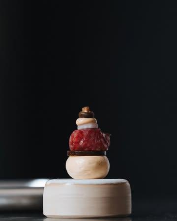 Chef @martijndefauw from @restaurantrebelle presents a refined amuse of Wagyu tartare, wrapped in dried Wagyu and elevated with beef Garum in a meringue, emulsion and gelée.

Chosen for its subtle salinity and rich umami, Beef Garum enhances the natural flavour of the Wagyu without ever overpowering it.

Discover the ingredients behind extraordinary flavour.
∿ monarti.be
