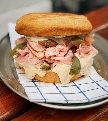 Vitello tonnato roll special!

This classic dish, is made entirely from scratch with love and attention to detail. All homemade in house!

The rich flavors of the Vitello Tonnato beautifully complement the buttery, flaky texture of the croissant bun. 

Tender veal cooked to perfection for a melt-in-your-mouth texture.

Creamy Tuna Sauce: A unique blend of tuna, capers, and anchovies from @sardineshop.be that elevates the dish.

Limited available…