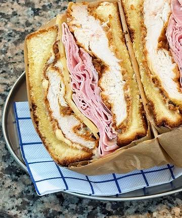 Introducing Our Chicken Cordon Bleu Sandwich!

Enjoy a delicious combination of crispy fried buttermilk chicken, premium ham, “Groendal” cheese by Van tricht, and a cheese sauce, all stacked on a freshly toasted brioche bread. 

Comfort food with a gourmet twist.